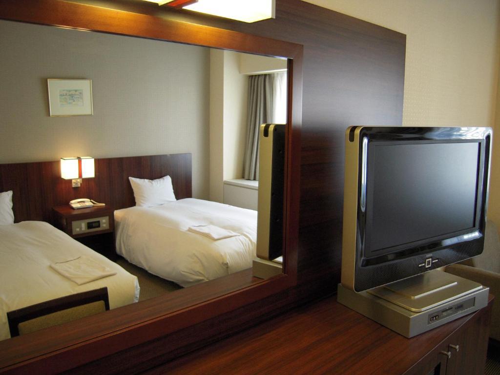 Hotel Sunroute New Sapporo Chambre photo